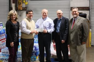 From Left to right - Stephanie Linkous - Executive Director United Way McMinn-Meigs, John Gentry- County Mayor, Rody Blevins - President/CEO Volunteer Energy Cooperative, Erbin Baumgardner - VECustomers Shares Board Member, and Mike Frazier-VEC Board Member McMinn County. 